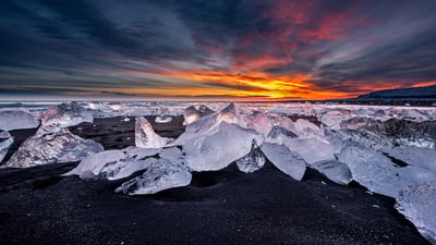 Bing wallpaper January 4, 2021. Diamond Beach across from Jökulsárlón, a glacial lagoon in Iceland (© surangaw/Getty Images)