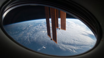 Bing wallpaper October 4, 2025. ISS main solar arrays seen from SpaceX Crew Dragon Endeavour (© NASA)