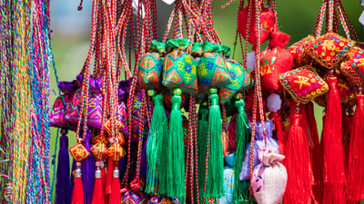 Bing wallpaper May 30, 2025. 用彩色丝线串成的香囊，端午节前夕的庙会上，吉林省吉林市，中国 (© Visual China Group/Getty Images)