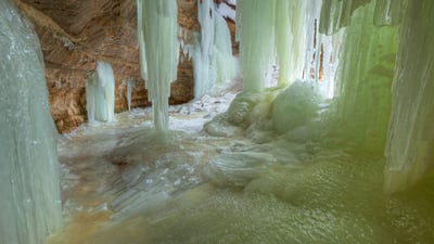 Bing wallpaper February 18, 2023. Eben Ice Caves, Upper Peninsula, Michigan (© Dean Pennala/Shutterstock)