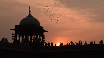 Bing wallpaper April 10, 2024. Muslims gather to offer prayers during Eid al-Fitr at Jama Masjid in New Delhi (© MONEY SHARMA/Getty Images)