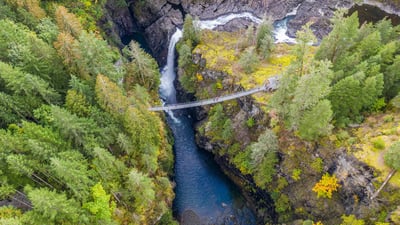 Bing wallpaper July 28, 2019. Aerial view of Elk Falls suspension bridge on Vancouver Island (© Ink Drop/Alamy Stock Photo)