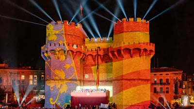 Bing wallpaper March 14, 2026. Vista de las Torres de Serranos durante La Crida de las Fallas, Valencia (© SOPA Images/Getty Images)