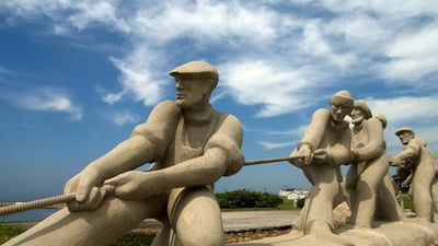 Bing wallpaper September 2, 2019. Fishermen Monument at L'Etang du Nord, Magdalen Islands, Que. (© Christian Goupi/Alamy Stock Photo)