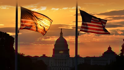 Bing wallpaper June 14, 2023. US Capitol building and US flags, Washington, DC (© Orhan Cam/Shutterstock)