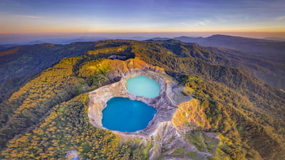 Bing wallpaper June 24, 2024. Volcanic crater lakes on Kelimutu, Flores, Indonesia (© Shane P. White/Minden Pictures)