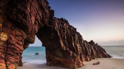 Bing wallpaper August 16, 2026. Pedra Furada, Jericoacoara, Brazil (© Brendan van Son/Shutterstock)