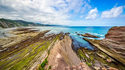 Bing wallpaper August 19, 2025. Layers of flysch in Zumaia, Basque Country, Spain (© Eloi_Omella/Getty Images)
