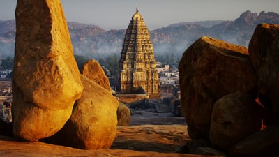 Bing wallpaper December 17, 2025. Granite rocks and gopuram of the Virupaksha Temple, Hampi, Karnataka (© Skouatroulio/Getty Images)