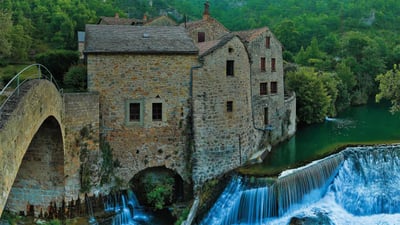 Bing wallpaper June 13, 2020. The Dourbie Gorge Corps Mill and adjoining bridge in Grands Causses Regional Nature Park, France (© Hemis/Alamy)