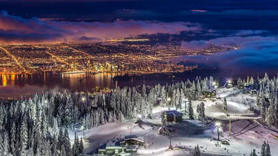 Bing wallpaper January 10, 2020. City lights from the snowy peak of Grouse Mountain at twilight, Vancouver, BC, Canada (© Pierre Leclerc Photography/Getty Images)