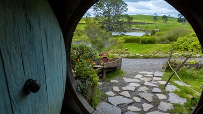 Bing wallpaper March 25, 2025. Hobbit-hole in Hobbiton Movie Set, Waikato, New Zealand (© Kim Petersen/Alamy)