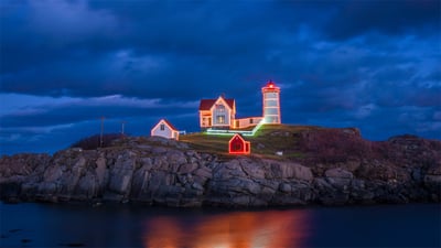 Bing wallpaper December 22, 2020. Holiday lights on Cape Neddick Light in York, Maine (© Walter Bibikow/Alamy)