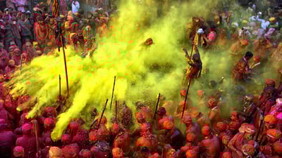Bing wallpaper March 7, 2023. Holi celebrations, Nandgaon, Uttar Pradesh, India (© Avishek Das/Getty Images)