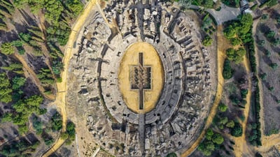 Bing wallpaper July 2, 2024. The Roman amphitheater of Italica, near Seville, Spain (© Moses Palermo/Amazing Aerial Agency)