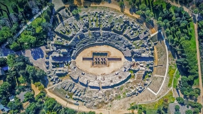 Bing wallpaper October 3, 2021. The Roman amphitheater of Itálica, near Seville, Spain (© Amazing Aerial Agency/Offset by Shutterstock)