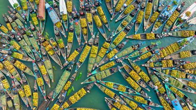 Bing wallpaper August 1, 2024. Floating market, Kaptai Lake, Rangamati, Bangladesh (© Azim Khan Ronnie/Amazing Aerial Agency)