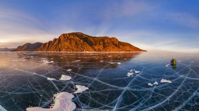 Bing wallpaper January 29, 2020. Aerial view of car crossing over the frozen surface of Lake Baikal, Russia (© Amazing Aerial Agency/Offset)