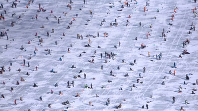 Bing wallpaper February 23, 2020. People ice fishing on Gull Lake in Brainerd, Minnesota, USA (© Robert Benson/Cavan)