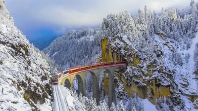 Bing wallpaper December 13, 2019. Bernina Express on the Landwasser Viaduct, Graubünden, Switzerland (© Marco Bottigelli/Getty Images)
