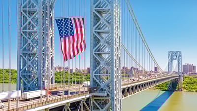 Bing wallpaper June 14, 2021. The George Washington Bridge displays the American flag in honor of Flag Day, June 14, 2016, Fort Lee, New Jersey (© Robert D. Barnes/Getty Images)