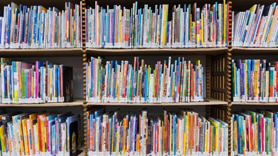 Bing wallpaper April 19, 2026. Books in the children's section of The New York Public Library, New York (© Ken Welsh/Alamy)