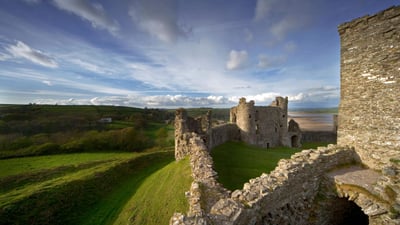 Bing wallpaper April 7, 2024. Llansteffan Castle, Carmarthenshire, Wales (© Roy Shakespeare/Loop Images Ltd/Alamy Stock Photo)