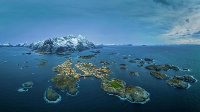 Bing wallpaper May 17, 2020. Fishing village of Henningsvær with Henningsvær Idrettslag Stadion, Nordland, Norway (© Viktor Posnov/Alamy)