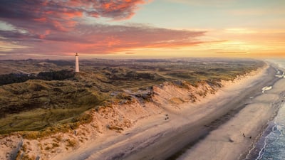 Bing wallpaper August 17, 2025. Lyngvig Lighthouse, Hvide Sande, Denmark (© Caroline Brundle Bugge/Getty Images)