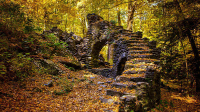 Bing wallpaper October 23, 2024. Madame Sherri Forest and the ruins of an old castle, New Hampshire (© yggdrasill/Shutterstock)