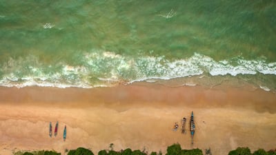 Bing wallpaper December 27, 2025. Aerial view of a sandy beach in Mangaluru, Karnataka (© Amith Nag Photography/Moment/Getty Images)