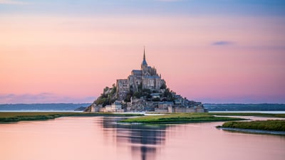 Bing wallpaper August 28, 2026. Mont-Saint-Michel during high tide, Manche, Normandy, France (© Clement LEONARD/Getty Images)