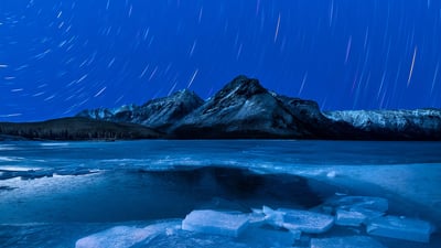 Bing wallpaper December 1, 2023. Lake Minnewanka, Alberta, Canada (© Ken Phung/500px/Getty Images)