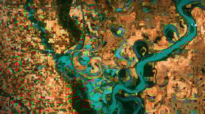 Bing wallpaper April 22, 2021. Mississippi River on the border between Arkansas and Mississippi (© NASA)