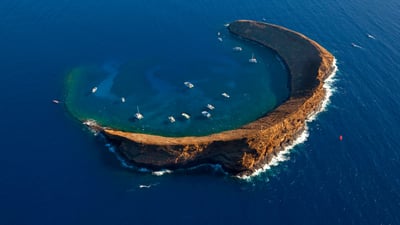 Bing wallpaper August 6, 2024. Molokini Crater, Maui, Hawaii (© Douglas Peebles/eStock Photo)