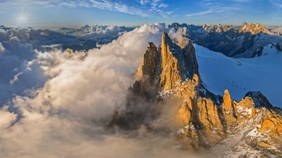 Bing wallpaper November 20, 2020. Aerial view of the Aiguille du Midi in the Mont Blanc massif, France (© Amazing Aerial Agency/Offset by Shutterstock)
