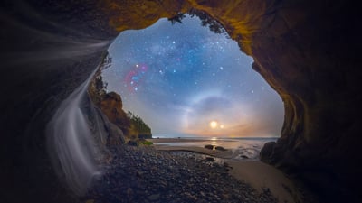 Bing wallpaper February 9, 2021. Moon dog photographed at Hug Point Falls on the Oregon coast (© Ben Coffman/Tandem Stills + Motion)