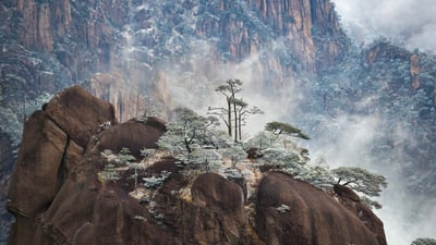 Bing wallpaper December 11, 2023. Winter at Huangshan, China (© Hung Chung Chih/Shutterstock)