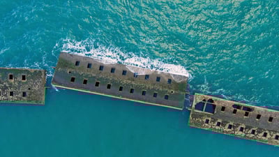 Bing wallpaper June 6, 2019. Remains of a Mulberry harbour from the D-Day invasion, Arromanches-les-Bains, Normandy, France (© Javier Gil/Alamy)