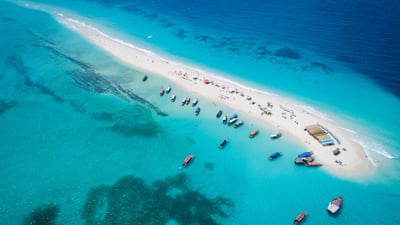 Bing wallpaper July 12, 2023. Sand bar in Nakupenda Beach Nature Reserve, Zanzibar, Tanzania (© Lubos Paukeje/Alamy)