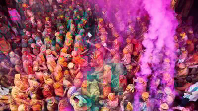 Bing wallpaper March 13, 2025. Lathmar Holi in Nandgaon and Barsana, Uttar Pradesh (© Idris Ahmed/Alamy Stock Photo)