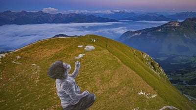 Bing wallpaper November 20, 2021. 'A New Breath' by artist Saype in Moléson-sur-Gruyères, Switzerland (© Valentin Flauraud/Shutterstock)