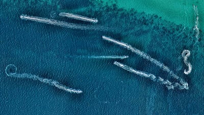 Bing wallpaper October 18, 2020. Aerial view of jet skis in the ocean, Australia (© Nearmap/Getty Images)