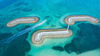 Bing wallpaper July 23, 2021. ｢サンマリーナビーチの桟橋｣沖縄 (© kokouu/Getty Images)