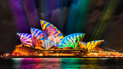 Bing wallpaper May 27, 2019. Sydney Opera House light beam projections during Vivid 2017 (© Taras Vyshnya/Alamy Stock Photo)