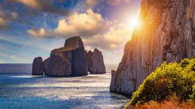Bing wallpaper August 9, 2023. Pan di Zucchero sea stack in Masua, Sardinia, Italy (© DaLiu/Getty Images)