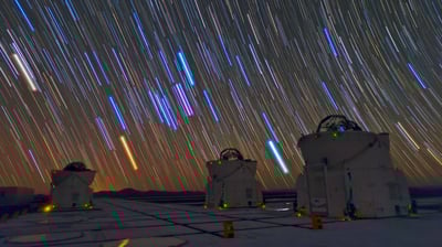Bing wallpaper May 15, 2021. Telescopes and star trails at Paranal Observatory, Atacama Desert, Chile (© Matteo Omied/Alamy)