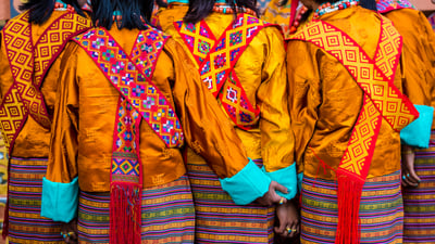 Bing wallpaper April 8, 2025. Women in traditional dress at the Paro Tshechu Festival in Bhutan (© Richard I'Anson/Getty Images)