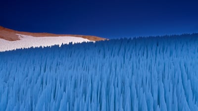 Bing wallpaper February 10, 2021. Nieve penitente ice formations seen on Agua Negra Pass in the Coquimbo Region of the Andes, Chile (© Art Wolfe/Danita Delimont)