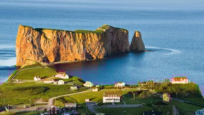 Bing wallpaper April 26, 2022. Percé Rock off the Gaspé Peninsula, Quebec (© Design Pics/DanitaDelimont.com)
